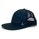 Electro Trucker Hat profile view – recycled mesh trucker hat with geometric art