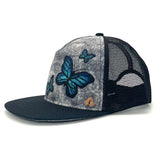 Side view of Mariposa Trucker Hat – Fair Trade summer cap with lightweight mesh and printed art