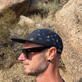 Wanderlust Lines Hat male model wearing breathable fair trade Wanderlust Lines hat
