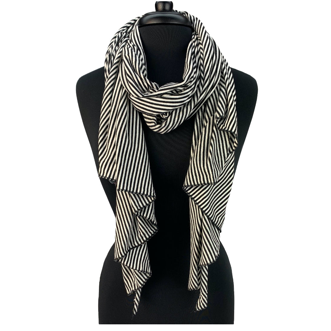 Amber Scarf in day-and-night color way, black and white, front view on mannequin – upcycled cotton blend winter scarf