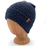 UP Beanie in Dusk color – worn on wooden head block.
