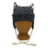 Wildkat Beanie in Blue Speck color way, front view on wooden head block – fun kids fleece hat with ears by G & L Positive Goods