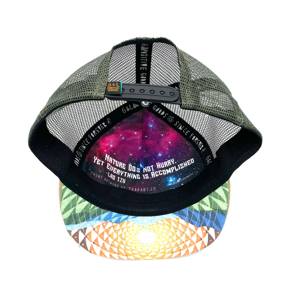 Five-panel low-profile graphic print Horizon Vista Trucker Hat. Adjustable snap with mesh back. Inspirational quote inside.