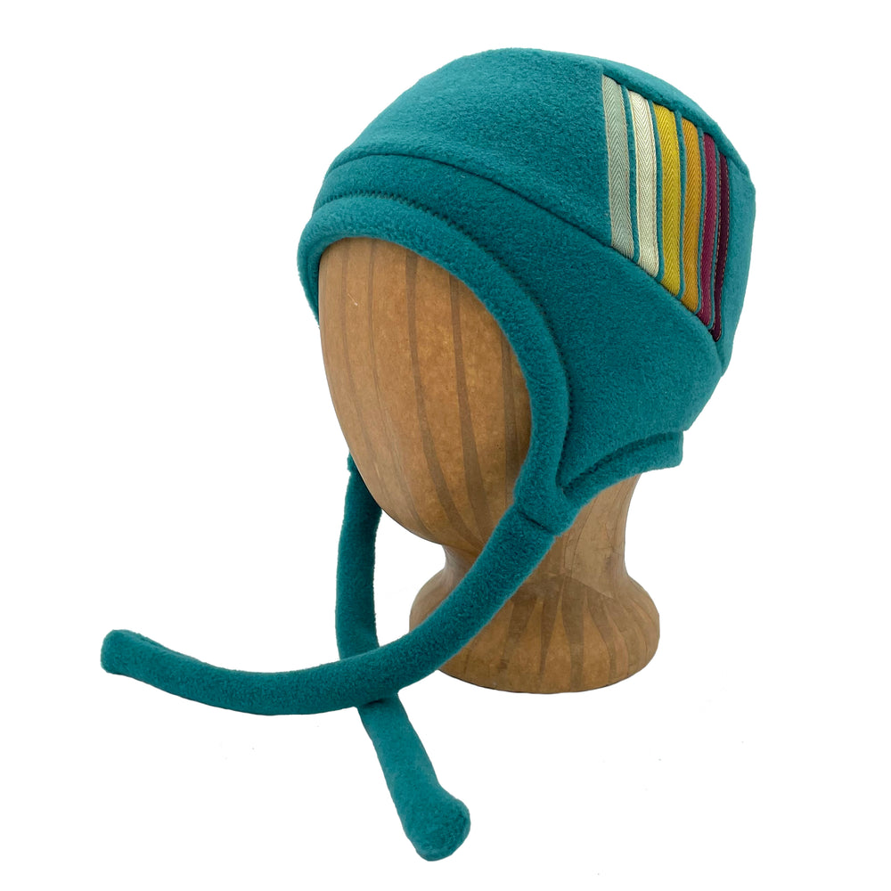 Colorful kids hat with ear flaps and chin straps. Made in the USA from Polartec fleece. Shop sustainable hats. *aquamarine