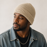 Denali Beanie side view in Linen color – worn by a man