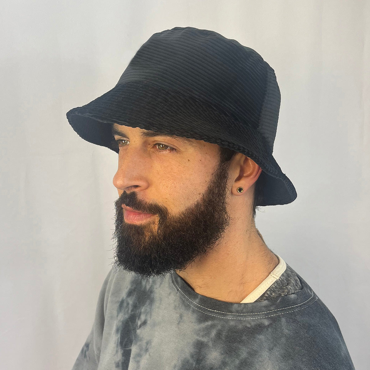 Black Bucket Hat Cotton Corduroy on male model – upcycled wide wale unisex hat