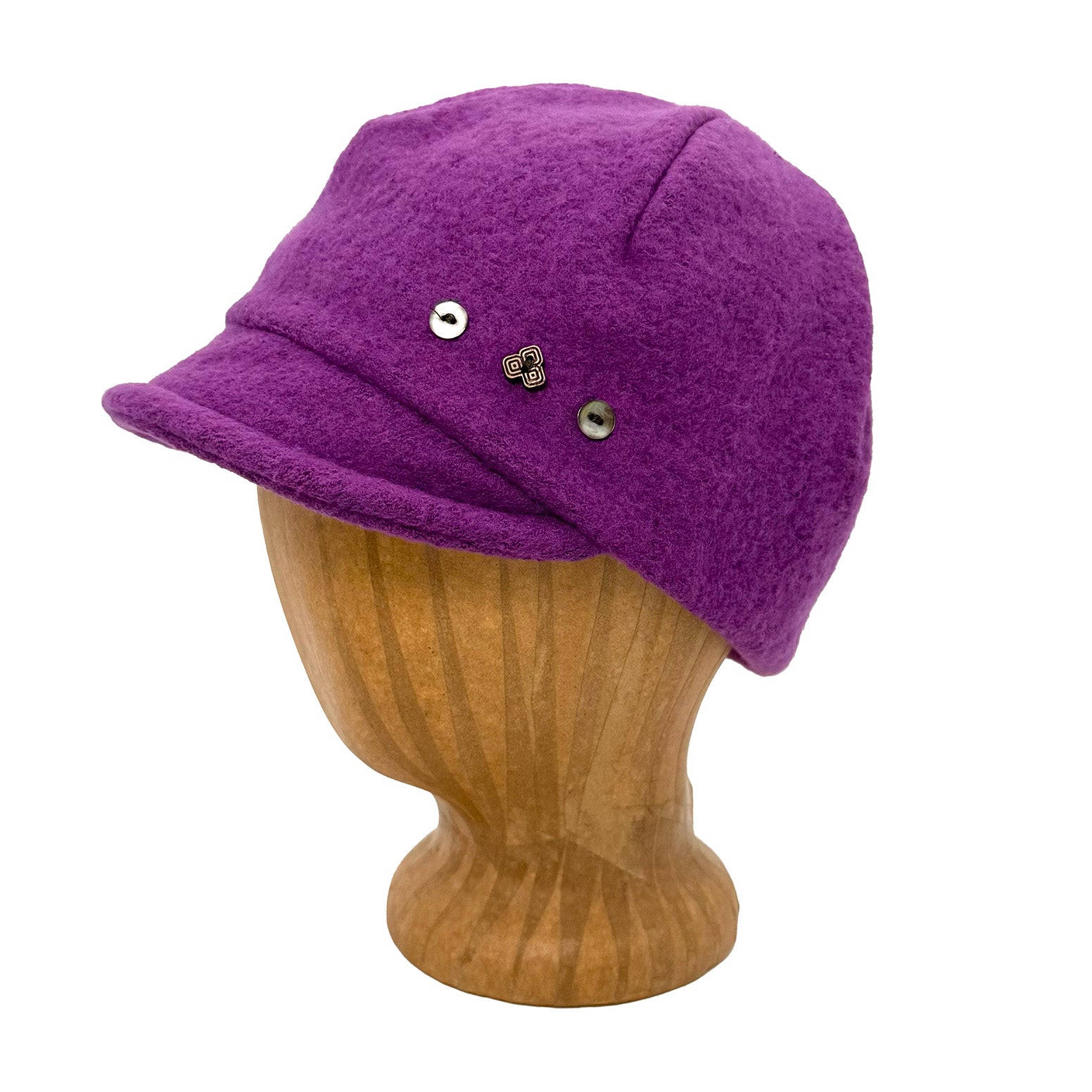 magenta cap on a wooden mannequin head against a white background g-and-l-positive-goods-camden-cap-left-side