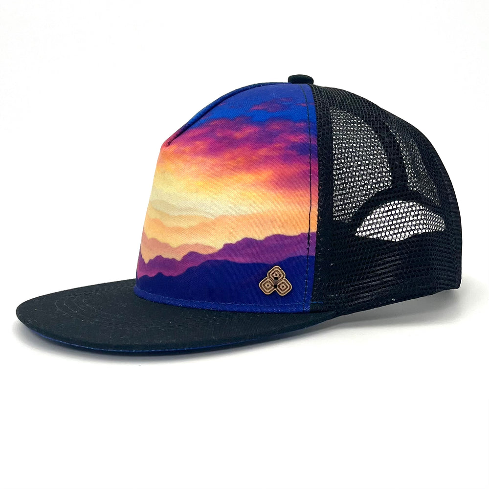 Three quarter view of Horizon Gratitude Trucker Hat – nature-inspired lightweight summer hat with mesh back
