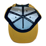 Underside view of Neeko Old Gold 5 Panel Cap – lightweight recycled 5 panel hat in golden tone