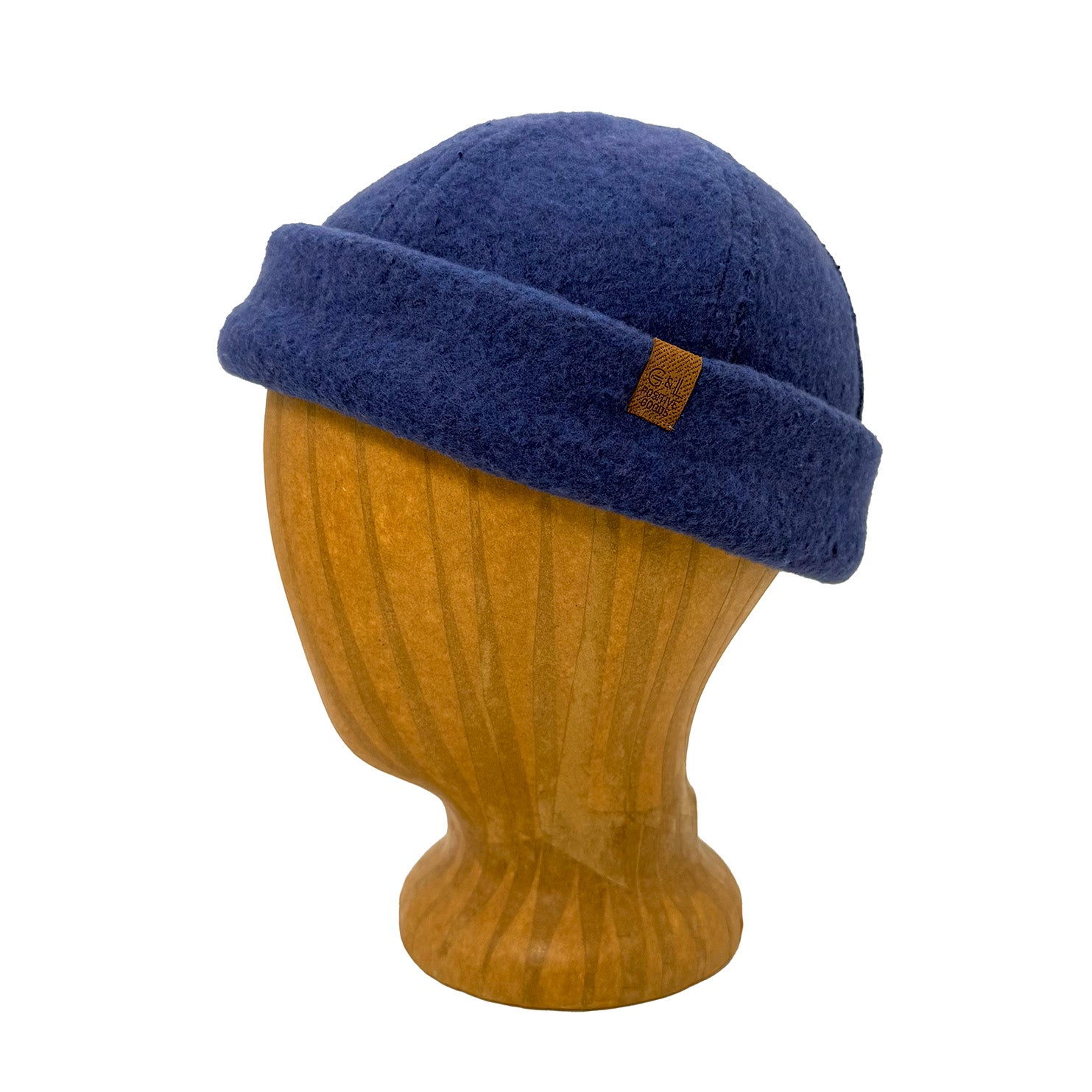 Blue beanie on a wooden mannequin head against a white background  g-and-l-positive-goods-shorty-brimless-cap-left-side
