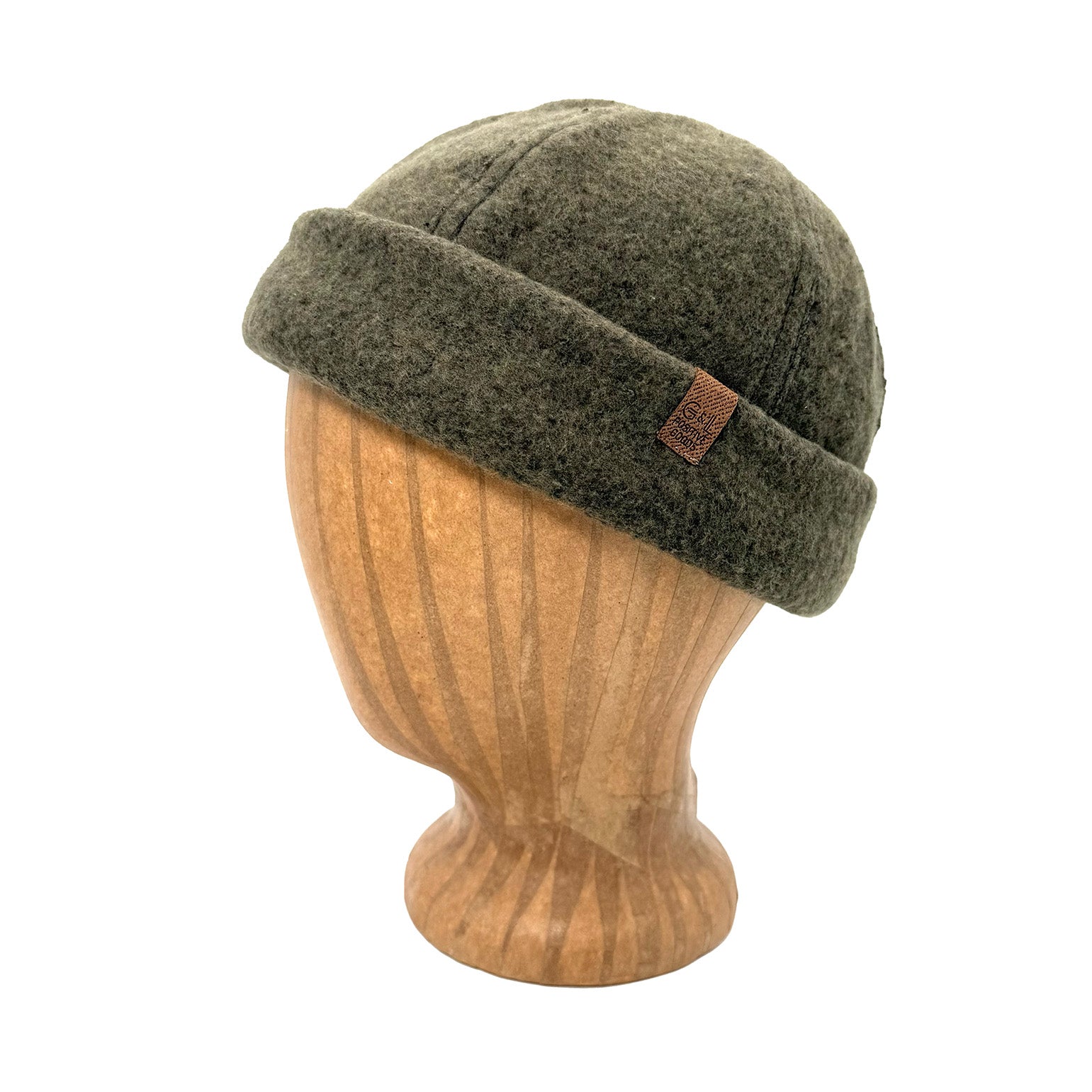 Green beanie on a wooden mannequin head with a white background  g-and-l-positive-goods-shorty-brimless-cap-left-side