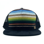 Front view of the Zuma Azure Trucker Hat with hand-loomed cotton, faux suede visor, and adjustable mesh snapback.