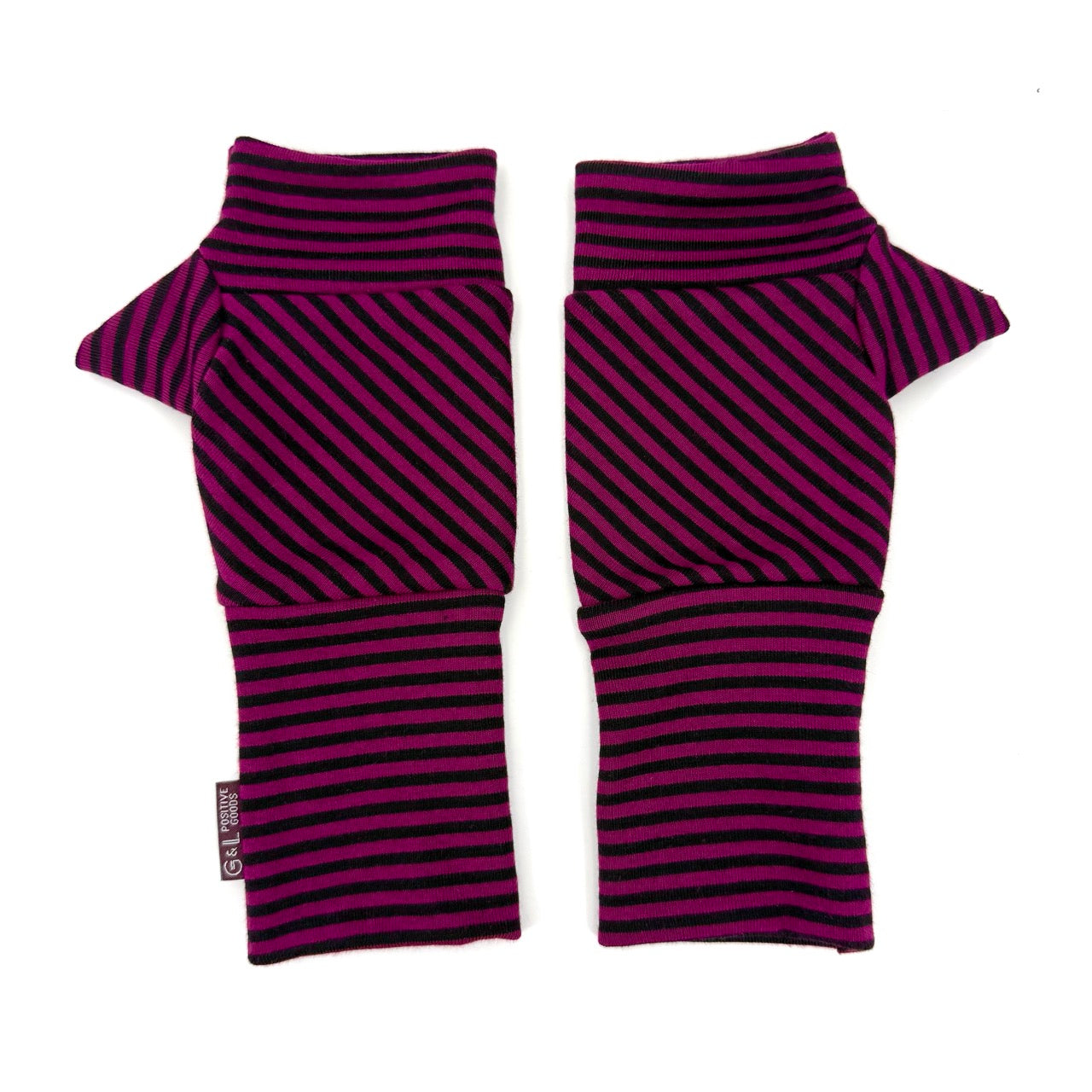 A pair of fingerless knit wrist warmers with diagonal dark pink and black stripes, laid flat on a white background.