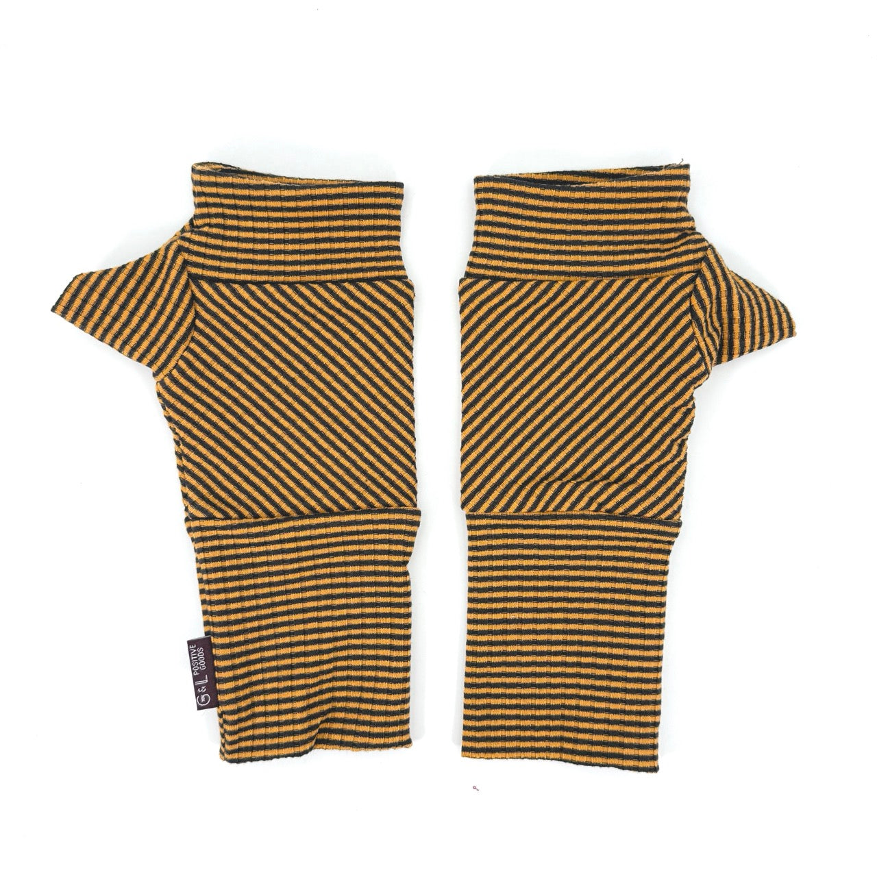 A pair of fingerless knit mittens with diagonal striped patterns in mustard yellow and black, laid flat on a white background.
