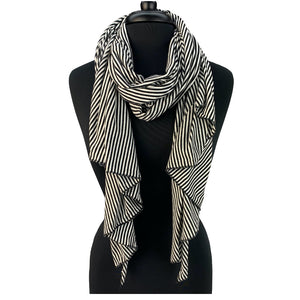 Amber Scarf in day-and-night color way, black and white, front view on mannequin – upcycled cotton blend winter scarf