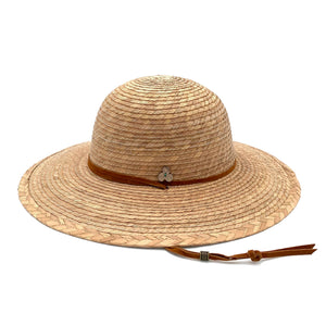 Profile view of Anya Palm Straw Sun Hat, showing artisan weave and eco-friendly materials.