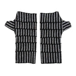 A pair of fingerless knit gloves with a black and gray striped pattern, laid flat on a white background.
