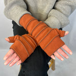 Crossroads Polar Fleece Wrist Warmers – Female Model Wearing – Made in USA - Terracotta color 