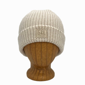 Denali Beanie front view in Linen color – worn on wooden head block.