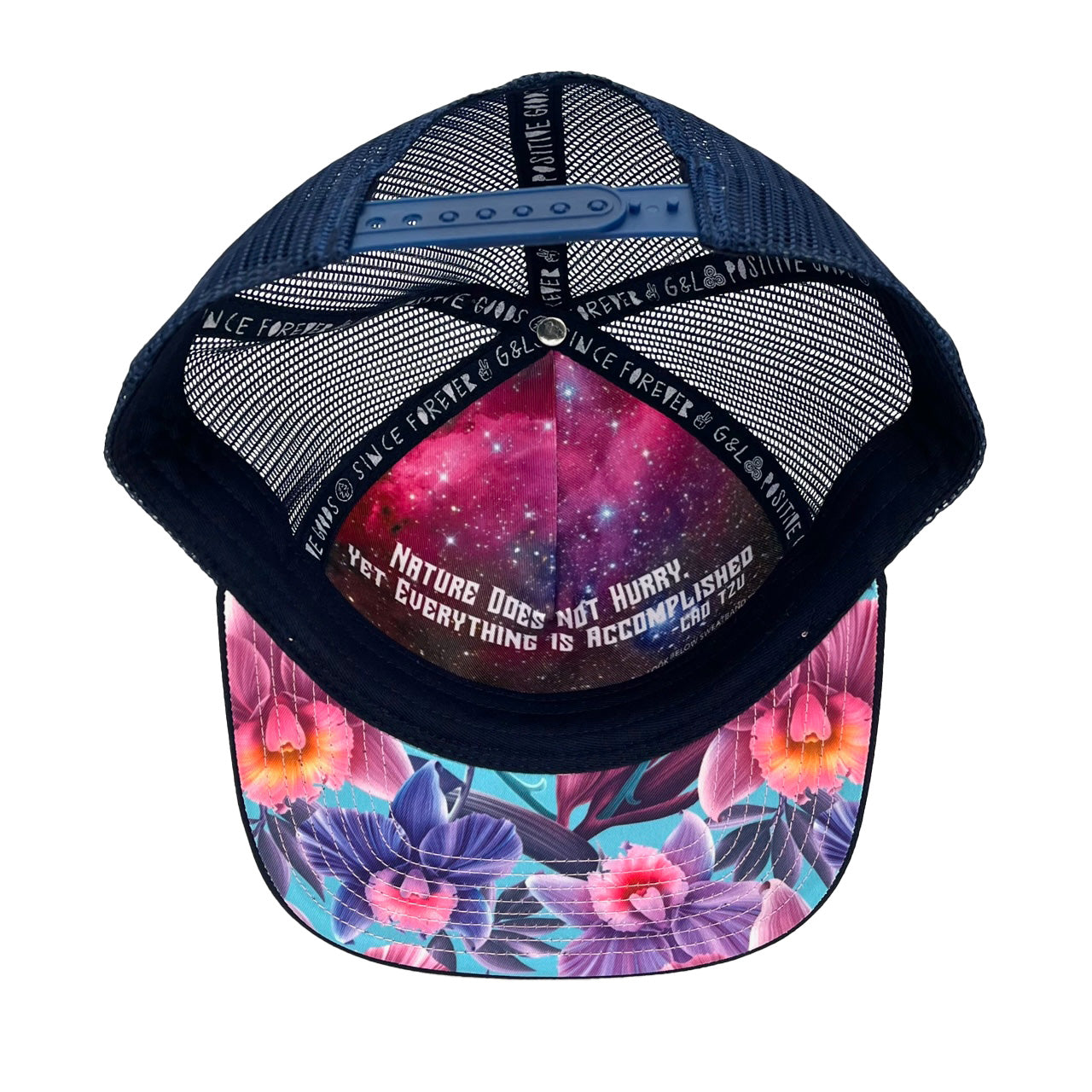 Underside of Floral Orchid Trucker Hat highlighting breathable mesh back and inner quote.