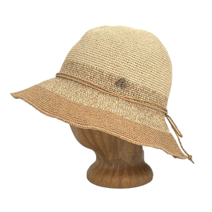 Side view of Tan Marl Weave Frida Toyo Straw Sun Hat, hand-crocheted with wide brim and adjustable sweatband.