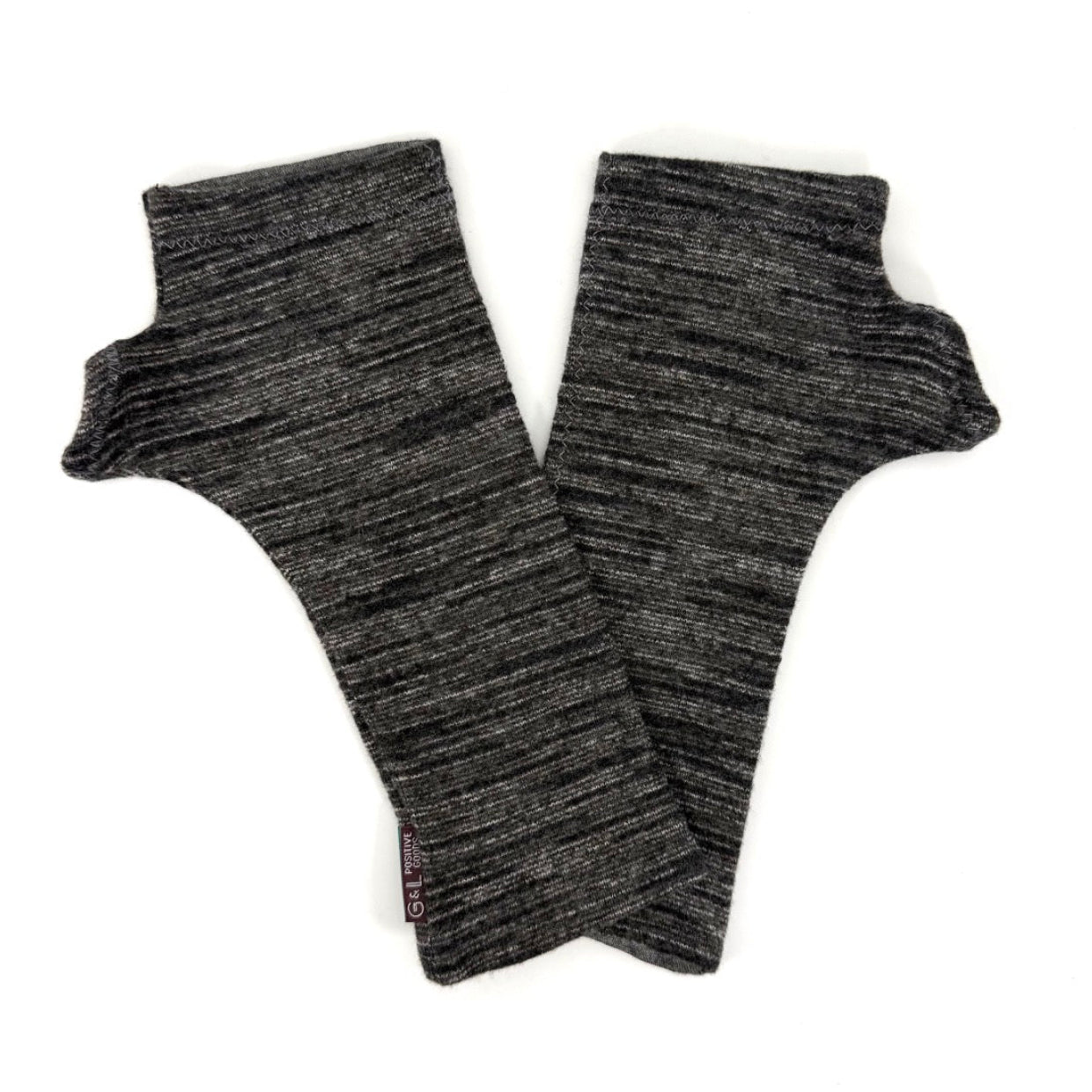 A pair of dark gray and black heathered ribbed knit fingerless gloves laid flat on a white background.