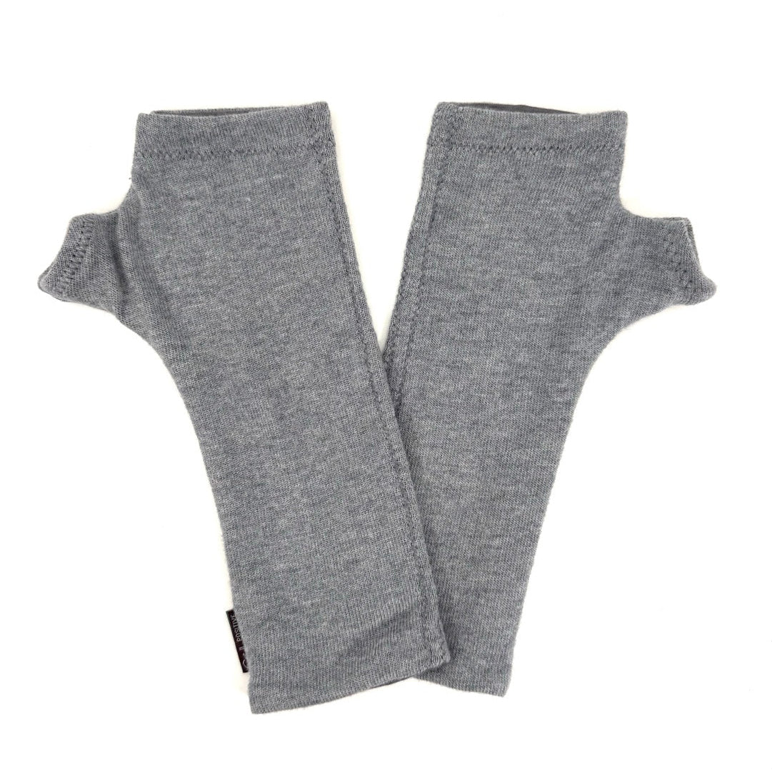 A pair of heather gray fingerless knit arm warmers laid flat on a white background.