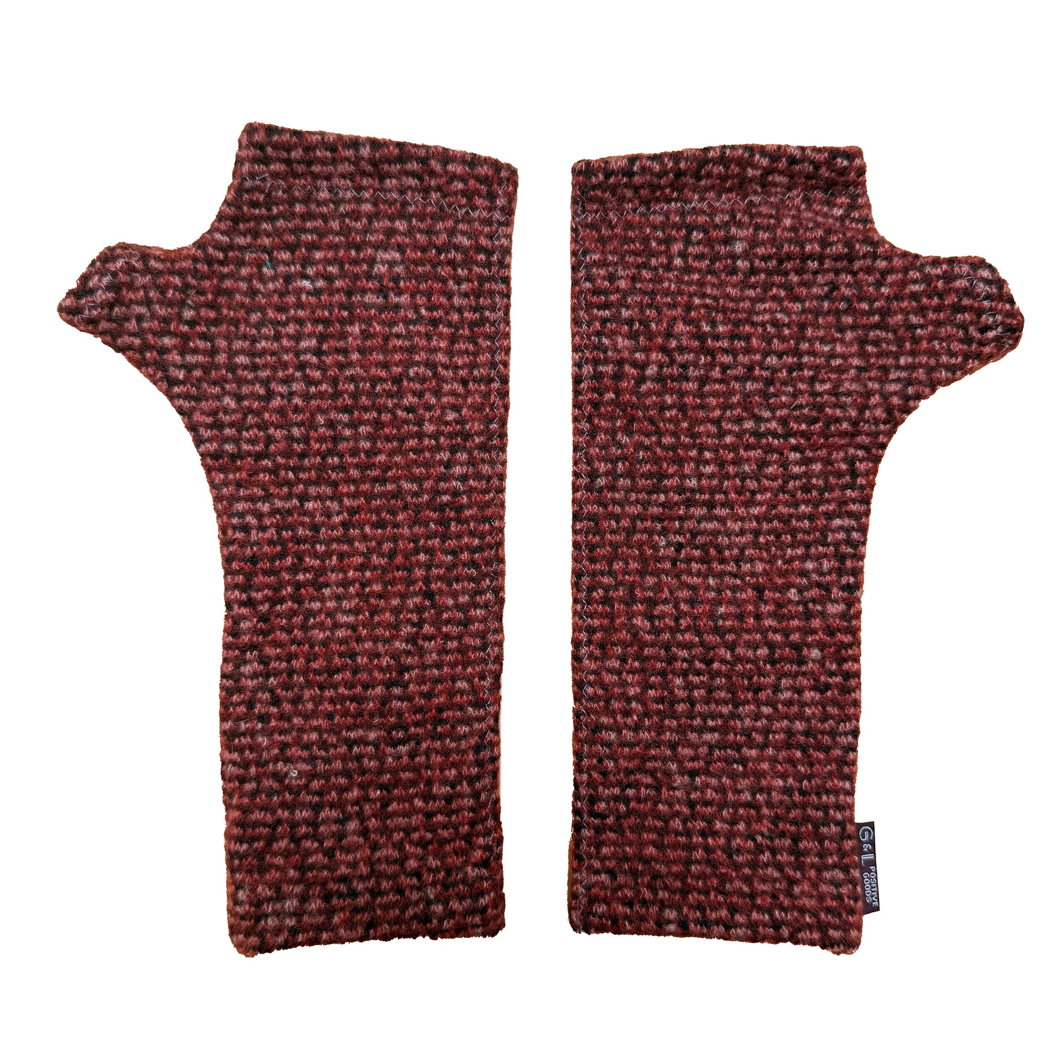 Pair of red and black patterned fingerless gloves on a white background
