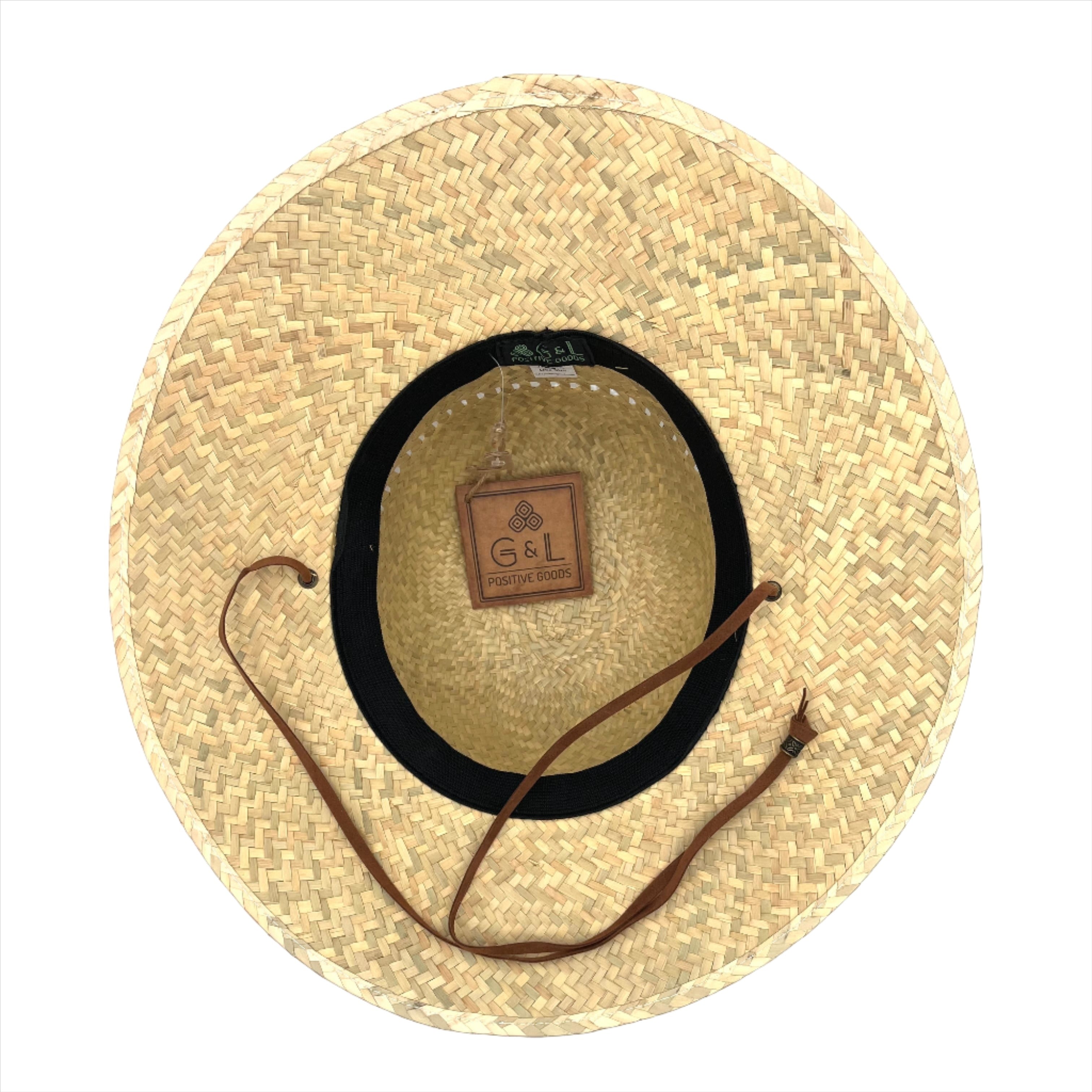 Underside of Hana Palm Straw Sun Hat highlighting breathable palm weave and handmade details.