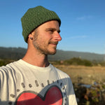 Hemingway Beanie in Fern green color on male model – eco-conscious warm winter beanie