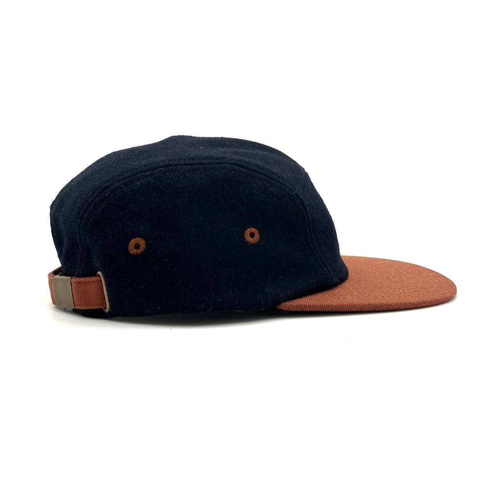 Back side three-quarter view of Kamp Hat with 5 panel structure and vintage wool design