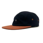 Three-quarter front angle of Kamp Hat with 5 panel structure and vintage wool design