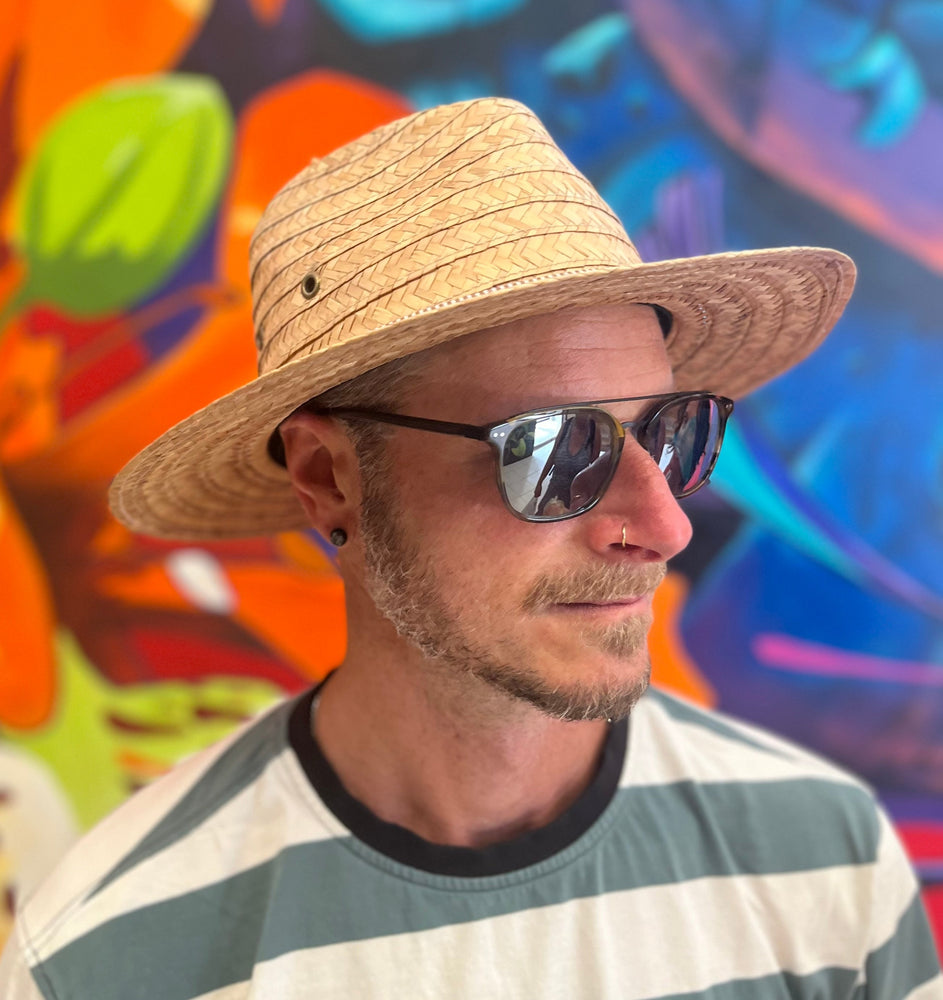 Mateo Fedora side view on male model – lightweight palm straw fedora