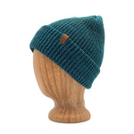 Oaktown Beanie in Forest Green color – worn on wooden head block.