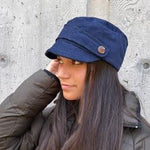 Rio Soft Cap in Navy Blue color on female model, profile view – soft cap for women in upcycled fabric