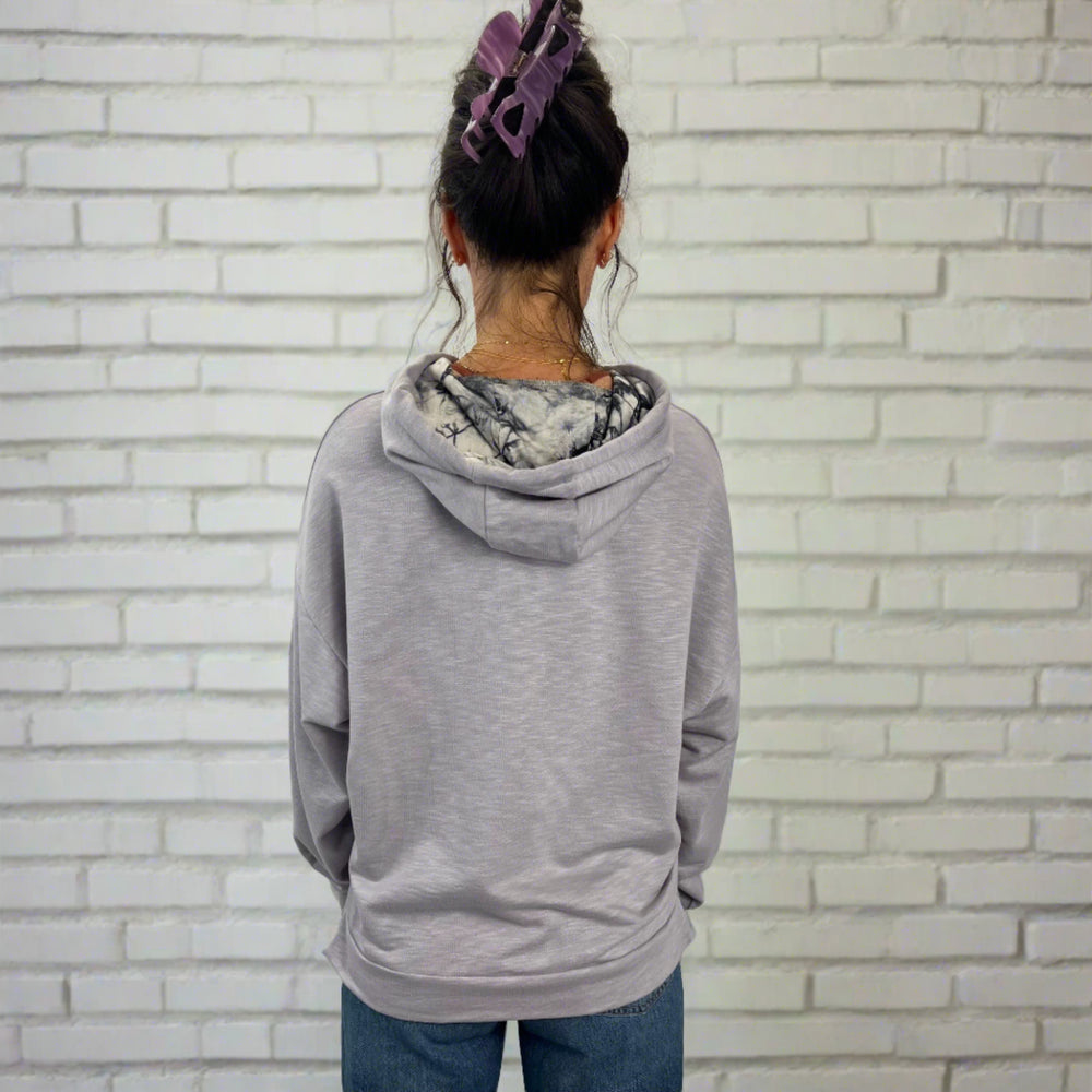 
                
                    Load image into Gallery viewer, Sea Breeze Lilac Hoodie female modeling showing back view – lightweight upcycled cotton blend women&amp;#39;s hoodie
                
            