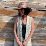 Female model wearing Shadow Sun Hat profile view – adjustable chin strap sun protection