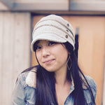 Soho Soft Cap in white linen color front view on female model – sustainable fashion headwear