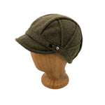An olive green wool cap with a curved visor and decorative buttons, displayed on a wooden mannequin head against a white background.