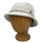 Taylor Bucket Hat in white linen color front view on wooden head block – eco-friendly recycled cotton soft cap