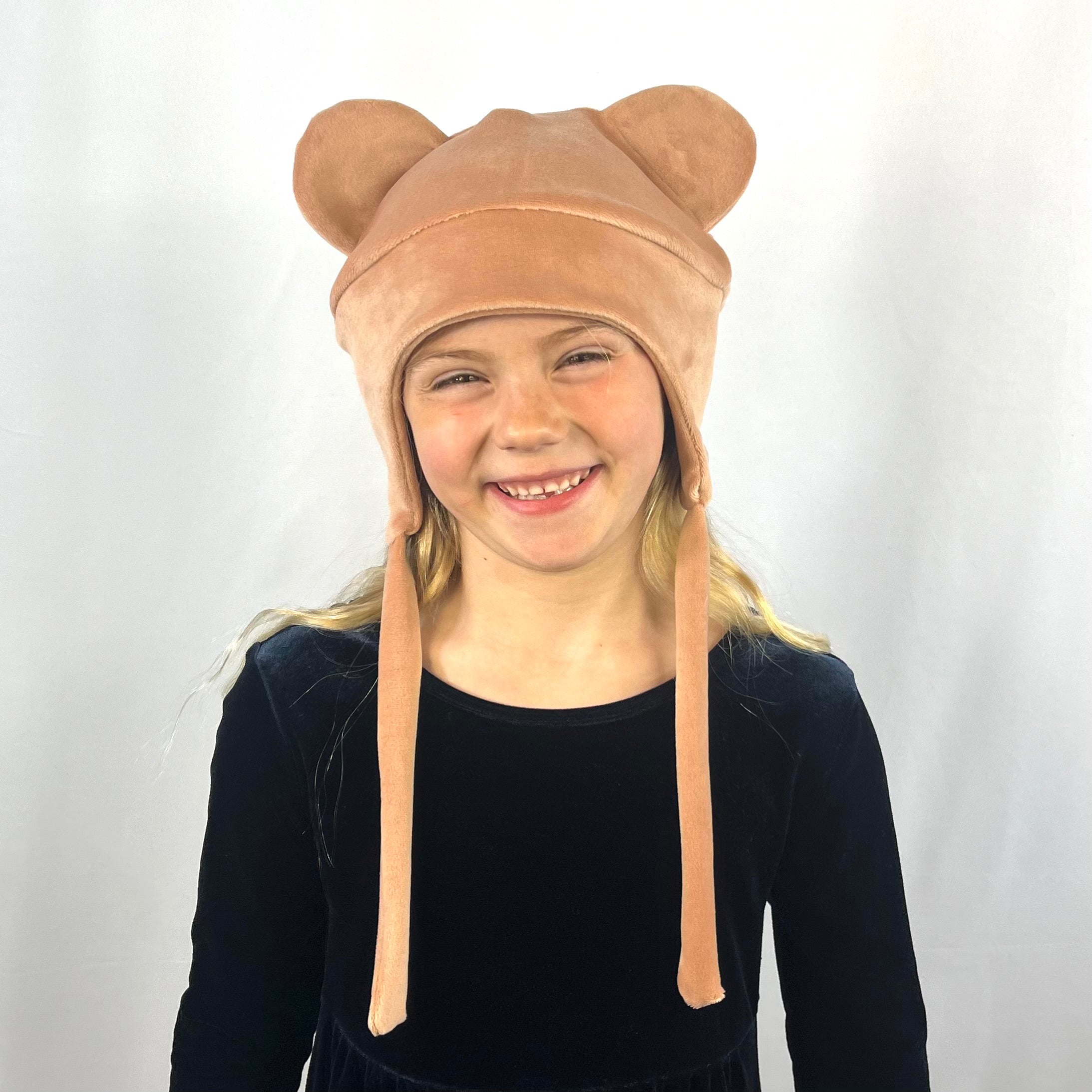 Teddy Kids Beanie – worn by girl model, showcasing animal ears and rosey color