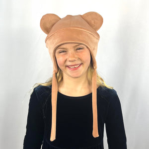 Teddy Kids Beanie – worn by girl model, showcasing animal ears and rosey color