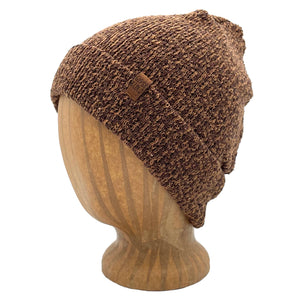 UP Beanie in Caramel color – worn on wooden head block.
