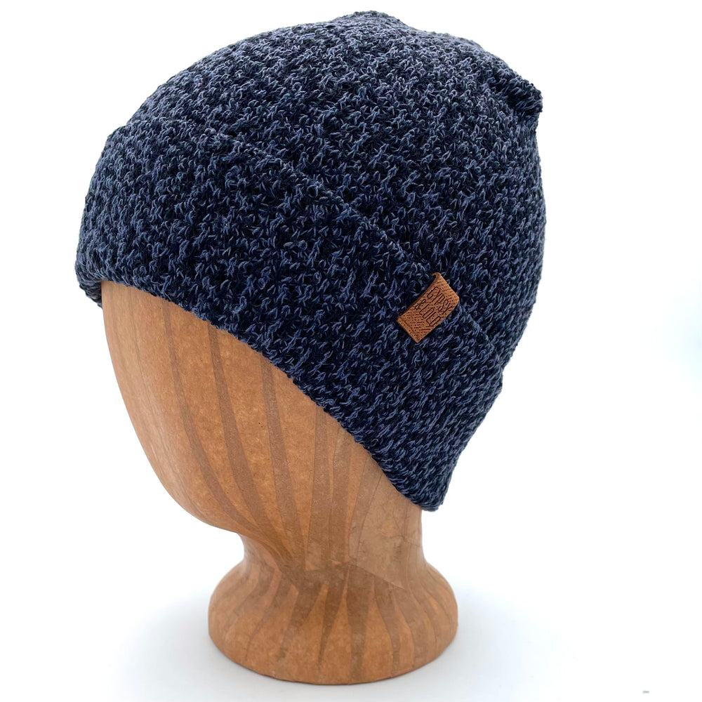 UP Beanie in Dusk color – worn on wooden head block.