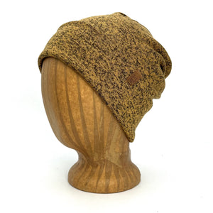 UP Beanie in Harvest Gold color – worn on wooden head block.