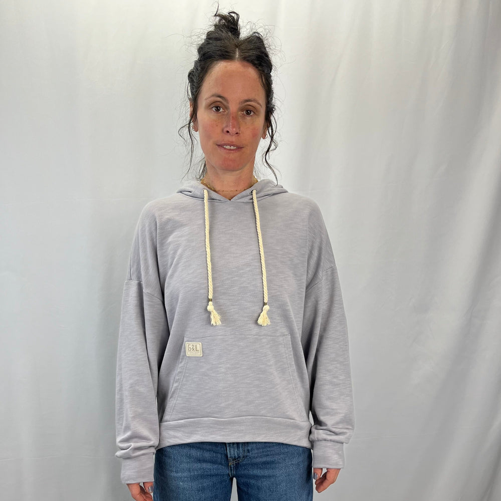 
                
                    Load and play video in Gallery viewer, Sea Breeze Lilac Hoodie video – female model in sustainable cropped hoodie for women in lilac
                
            