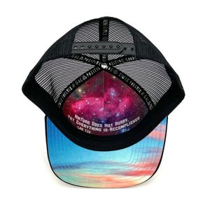 Five-panel low-profile graphic print Horizon Sunset Trucker Hat. Adjustable snap with mesh back.