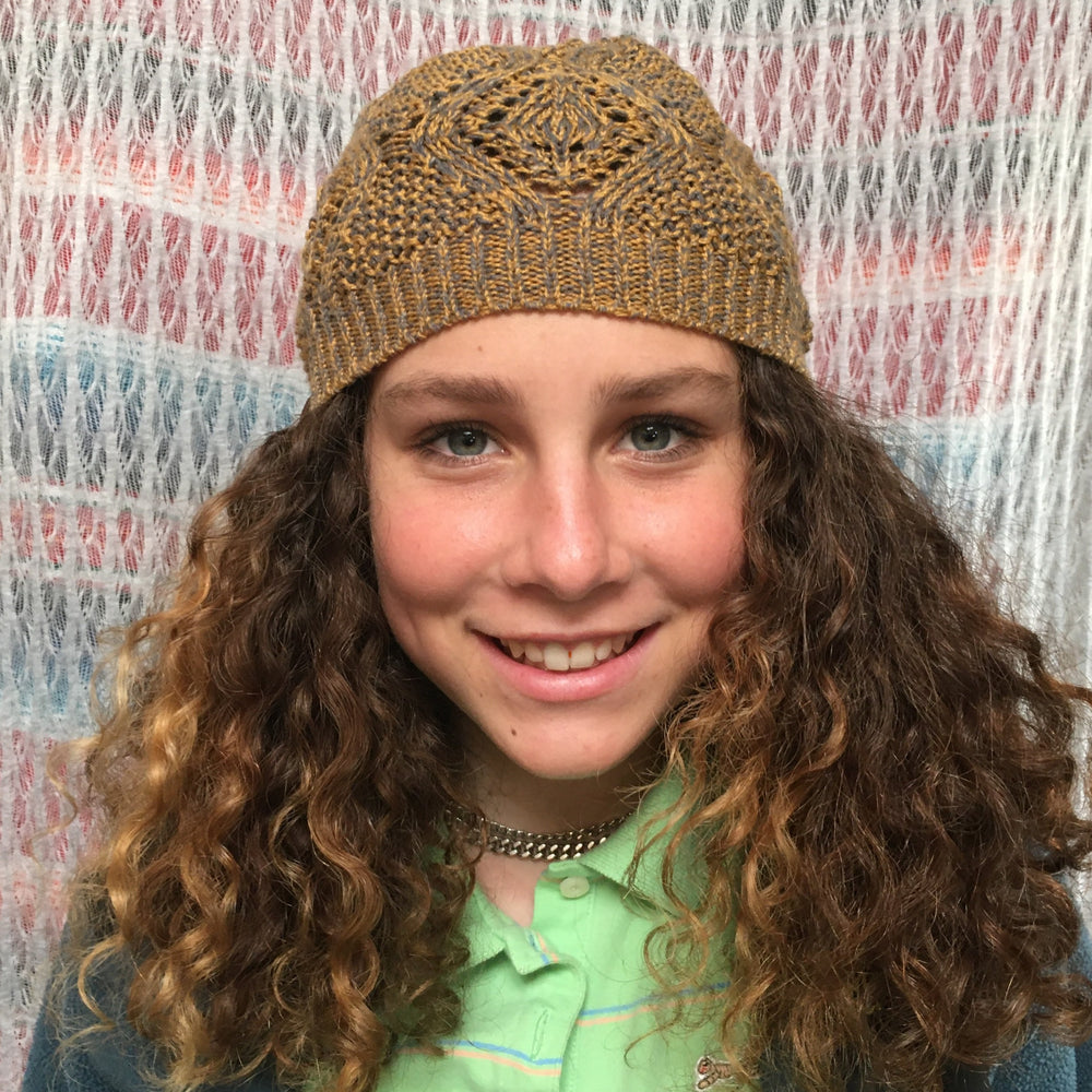 Soft cable knit beanie for women and girls. Made in Canada from recycled yarn. Shop eco-friendly gifts and unisex hats.