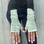Fully-lined rouched hand warmers. Rainbow of colors available. Easy to text fingerless gloves. Made in the USA.  *artichoke