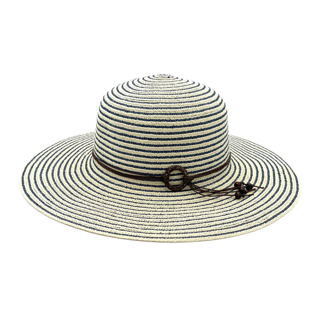 Handcrafted lightweight straw sun hat folds for easy travel. Cream and navy cotton string braids with shell detailing.  *indigo stripe